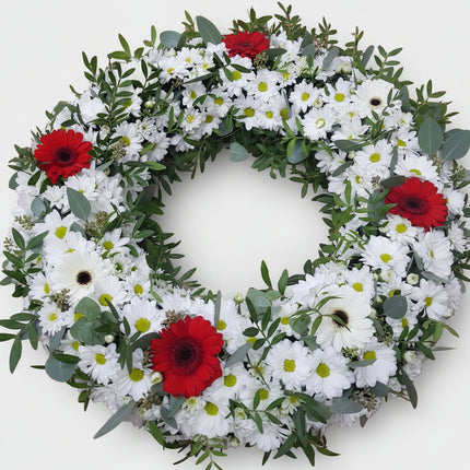 Coroana funerara circulara cu crizanteme si germini