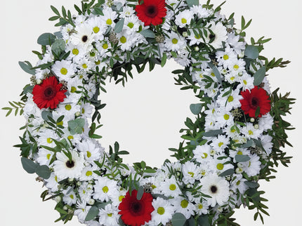 Coroana funerara circulara cu crizanteme si germini